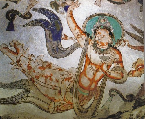 affresco di un Apsara in una grotta del complesso archeologico di Mogao vicino alla città di Dunhuang in Cina